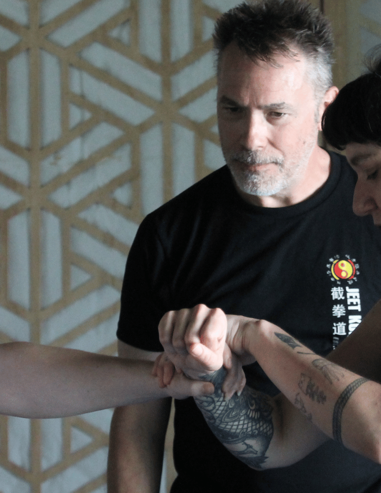 Sylvain Landry - Teacher of JKD classes at tension observing students